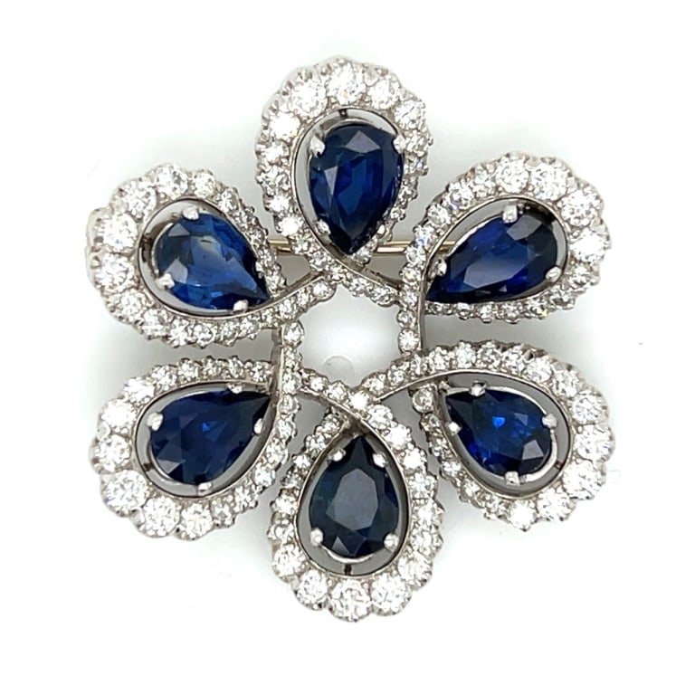 Art Deco Platinum Sapphire & Diamond Brooch: Item # 13520 Art Deco Platinum Sapphire & Diamond Brooch Weighing 19.4 grams Set with 6 Sapphires weighing app. 9.00 Ct. Along with 120 Diamonds weighing app. 3.50 Ct. F-G Color, VVS-VS Clarity 1.5