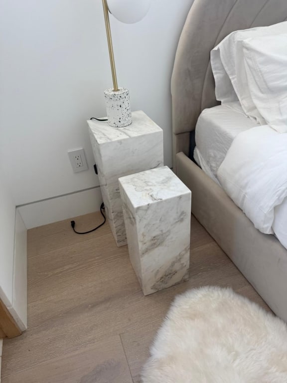 Tow pairs of white marble side tables: Two pairs of white marble side tables Dimensions: 22" high x 10" square and 18" high x 8" square PICK UP LOCATION - WEST LA, LOS ANGELES
