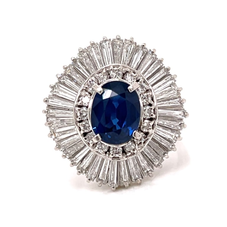 Platinum 2.51 Ct. Sapphire & Diamond Ring: Item # 13613 Category Rings Platinum 2.51 Ct. Sapphire & Diamond Ring Weighing 17.8 grams Set with a 2.51 Ct. Sapphire in Center Along with app. 3.00 Ct. of Diamonds F-G Color, VS1-VS2 Clarity Ring