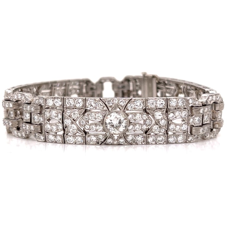 Art Deco Platinum 13.50 Ct. Diamond Bracelet: Item # 13619 Category Bracelets Art Deco Platinum 13.50 Ct. Diamond Bracelet Weighing 50.0 grams Set with 3 European-cut Diamonds weighing app. 3.00 Ct. F-G Color, VVS-VS Clarity Along with 306 Diamon