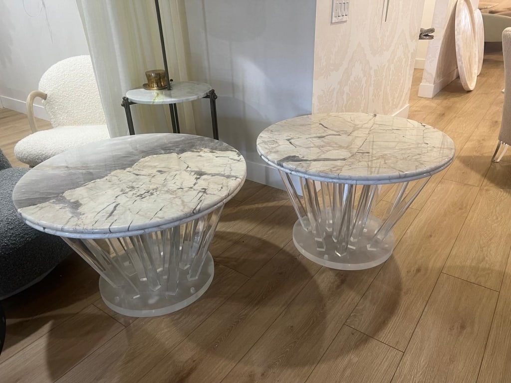 Pair of Patagonia marble lucite tables: Pair of Patagonia marble with double bullnose and lucite tables Dimensions: 38" diameter x 18" high PICK UP LOCATION - WEST LA, LOS ANGELES