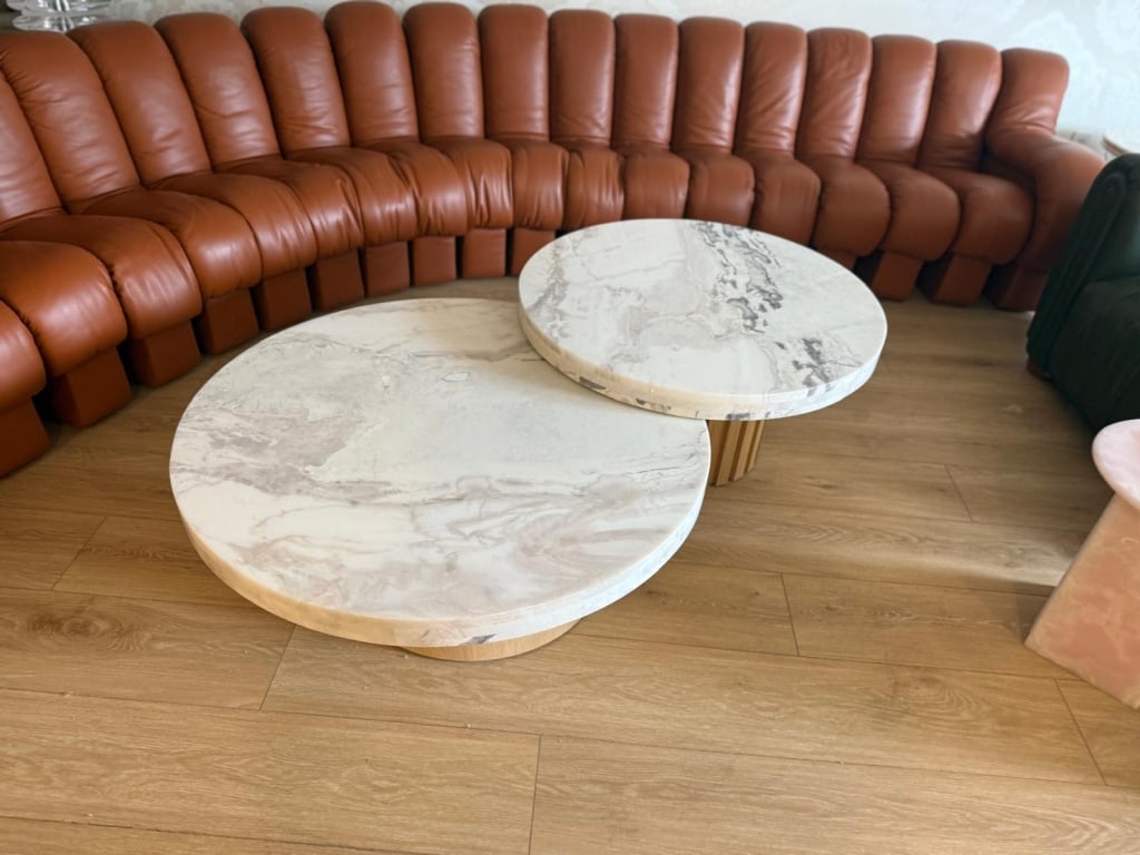 Pair of marble and oak fluted coffee tables nestin: Pair of marble and oak fluted coffee tables nesting. Dimensions: 42" High and 32" diameter PICK UP LOCATION - WEST LA, LOS ANGELES