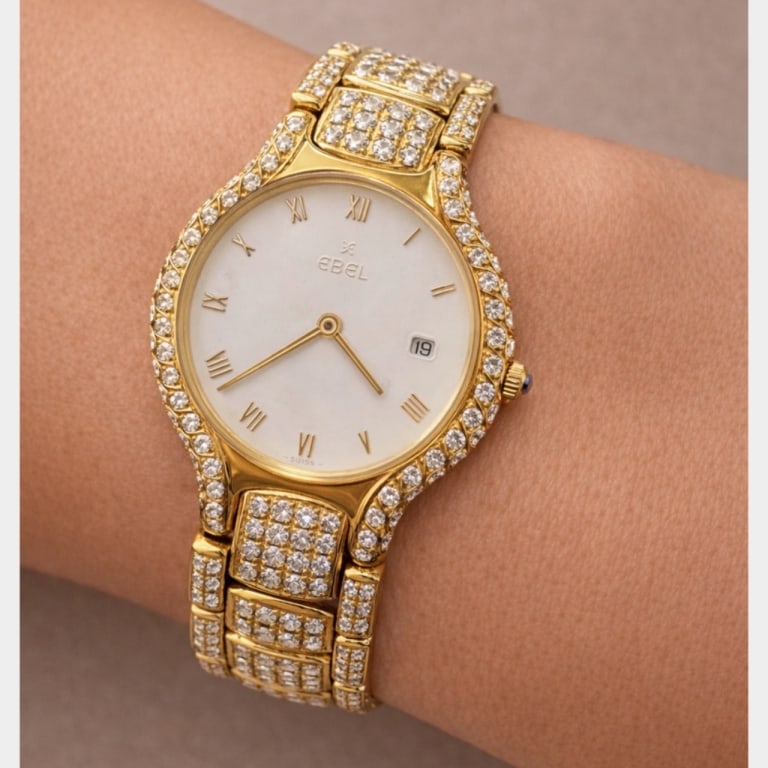EBEL 18K Yellow Gold Diamond Beluga Watch: Item # 13593 Category Watches EBEL 18K Yellow Gold Diamond Beluga Watch Weighing 115.5 grams Set with 602 Diamond weighing app. 16.50 Ct. D-F Color, VVS-VS Clarity (All factory, original diamonds) 31.