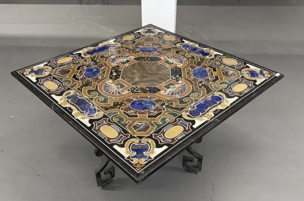 Superb Quality Inlaid Marble Top Entrance Table: Superb Inlaid Marble-Top Entrance TableExceptional quality table with shell-design top, inlaid with lapis and various natural hardstones. Raised on an ornate wrought iron base. A striking decorative c