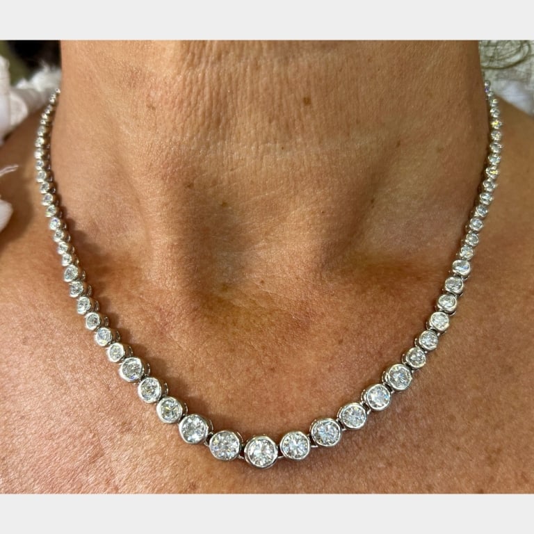 Platinum 11.00 Ct. Graduated Diamond Necklace: Item # 12925 Platinum 11.00 Ct. Graduated Diamond Necklace Weighing 51.8 grams Set with 92 Diamonds weighing app. 11.00 Ct. H-I Color, VVS-VS Clarity 16.5 inches in length