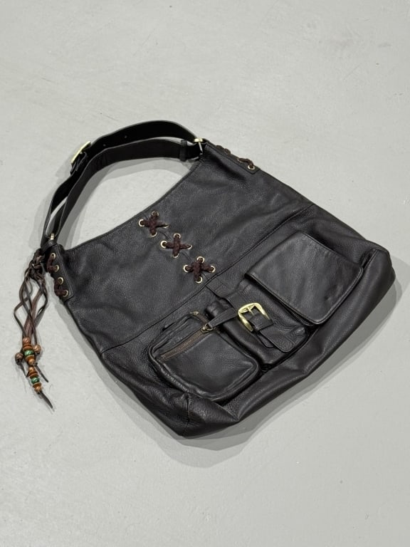 A Bottega Veneta Leather Purse: A Bottega Veneta Leather Purse, Measures 21 inches length