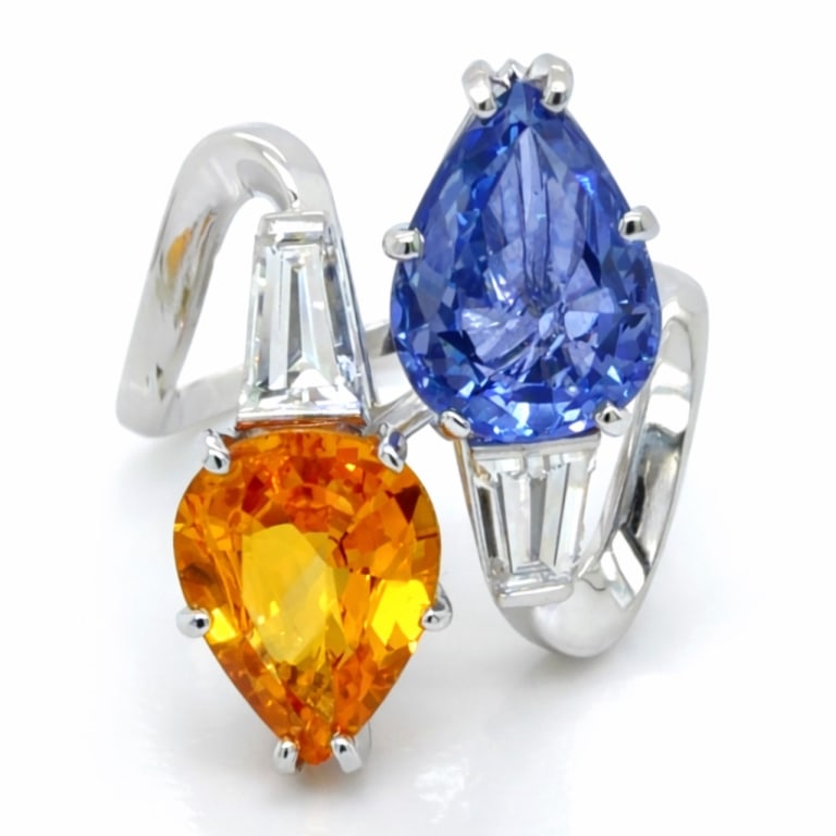 Platinum 5.91 Yellow & Blue Sapphire Diamond Ring: Item # 13667 Platinum 5.91 Ct. Yellow & Blue Sapphire and Diamond Ring Weighing 8.4 grams Set with a 3.15 ct. Blue Sapphire Along with a 2.76 Ct. Yellow Sapphire And 2 Baguette Diamonds weighing app.