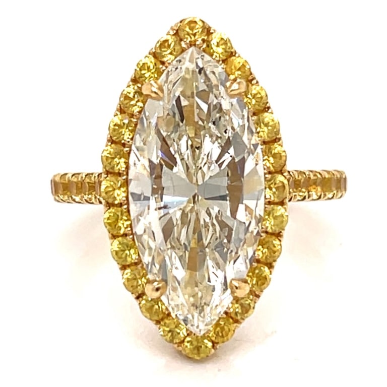 18K Yellow Gold 6.23 Ct. GIA Certified Diamond Rin: Item # 13633 18K Yellow Gold 6.23 Ct. GIA Certified Marquise Diamond Ring Weighing 9.2 grams Set with a 6.23 Ct. GIA Certified Marquise Diamond S-T Color, I1 Clarity 19.92 x 9.37 x 5.77mm GIA