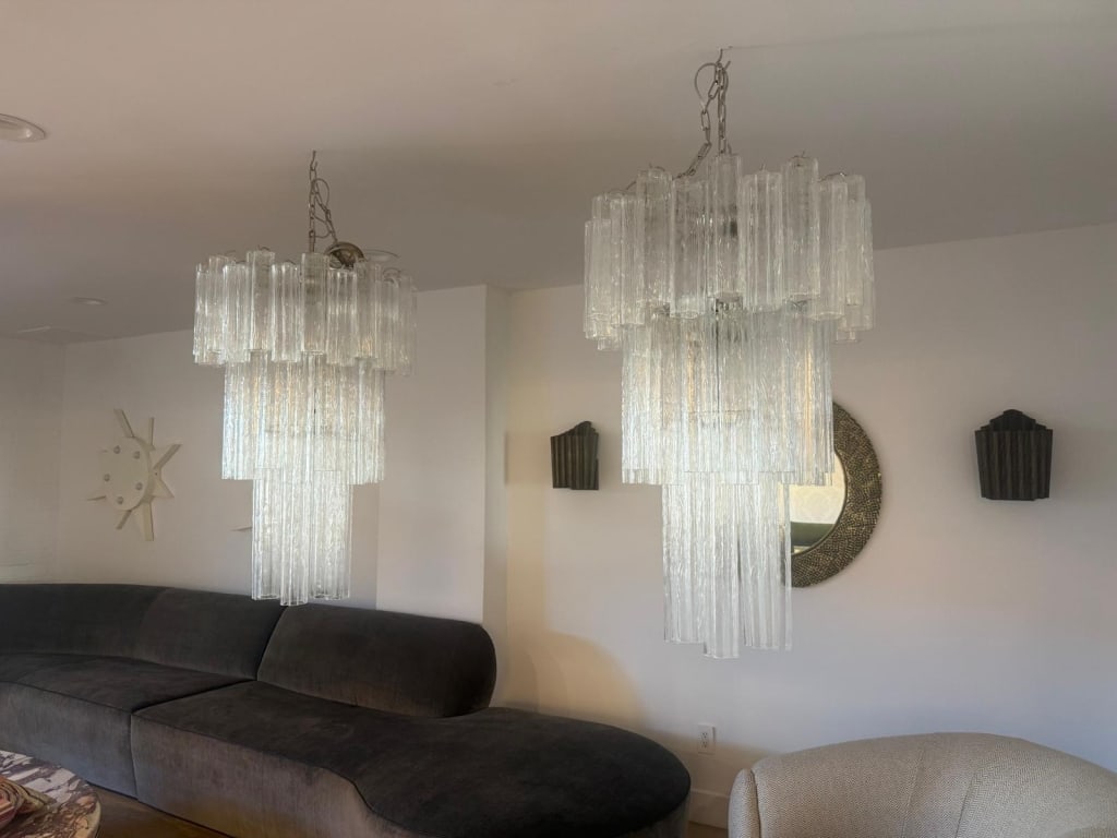 Pair of original Tronchi Chandleier’s: Pair of original Tronchi Chandleier’s Dimensions: 38 inches long without the chain PICK UP LOCATION - WEST LA, LOS ANGELES