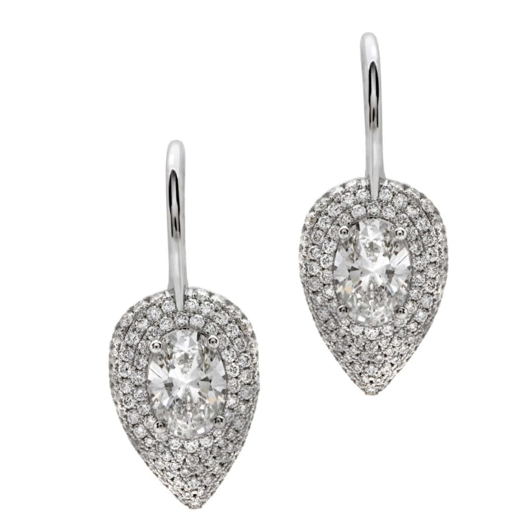 Elegant Oval Dangle Diamond Earrings in White Gold: Elegant Oval Dangle Diamond Earrings in White Gold – V49835 SKU: 49835 Gracefully minimalist and undeniably radiant, these oval dangle diamond earrings are the epitome of timeless sophistication.
