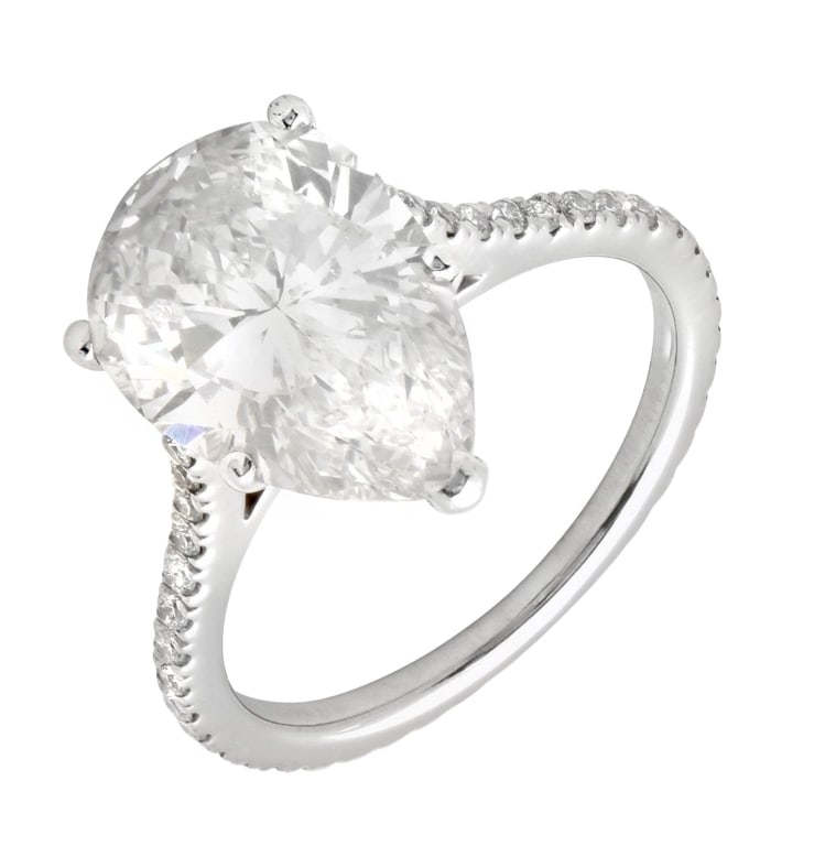 3.28ct Pear Shape Diamond Ring: 3.28ct Pear Shape Diamond Ring – V50604 SKU: 50604 A stunning blend of elegance and brilliance, this 3.28-carat pear shape diamond ring commands attention with its striking silhouette and