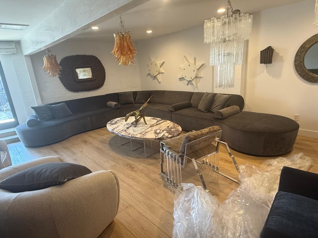 "Kagan" sofa in strie velvet with leather welt.: “Kagan" sofa in strie velvet with leather welt. Measures 14ft High x 17ft Wide x 42" Depth All items are coming from LA.