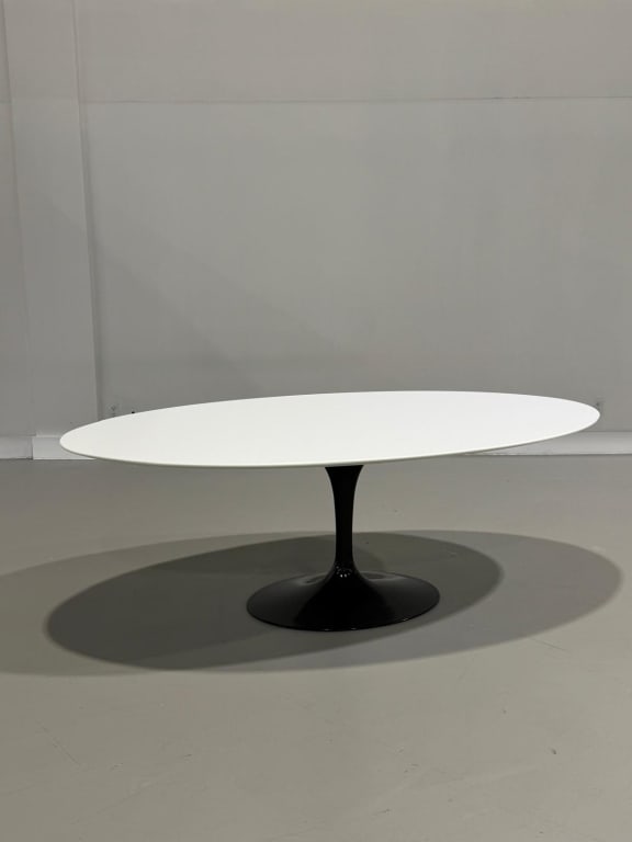 A Knoll Dining Table: A Knoll Dining Table Measures: 29 inches high 47 inches deep 84 inches length 1000-2000