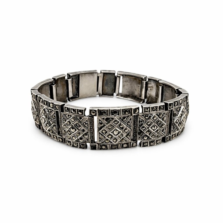 .925 Sterling Silver Gemstone Art Deco Bracelet: Vintage .925 sterling silver gemstone art deco bracelet. Stamped 'Sterling Germany' on clasp. Some signs of wear, couple of gem stones missing and tarnishing along inside of bracelet, otherwise in