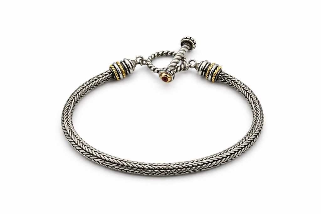 .925 Sterling Silver 18k Gold Rope Bracelet: Vintage .925 sterling silver 18k gold gemstone braided rope t bar bracelet. Stamped '925' '18k' 'BJC' on t bar. Signs of wear, otherwise in very good condition. Weight 22g