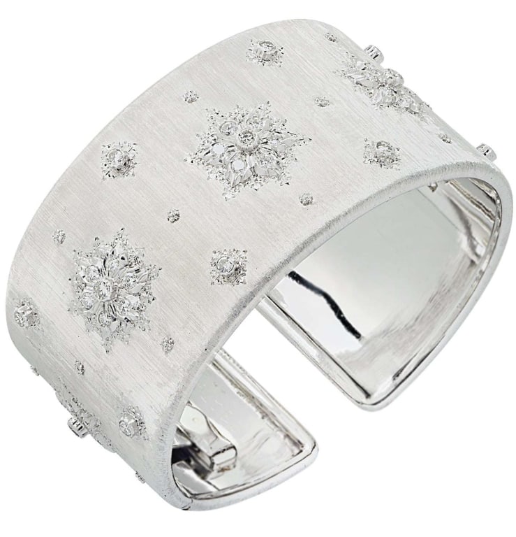 Buccellati Italy 18K White Gold Diamond Bangle: Buccellati Italy 18K White Gold Diamond Wide Cuff Bangle with Hand-Engraved Finish SKU: 46610 Elevate your jewelry collection with the Buccellati Italy White Gold and Diamond Wide Cuff Bangle. This ex