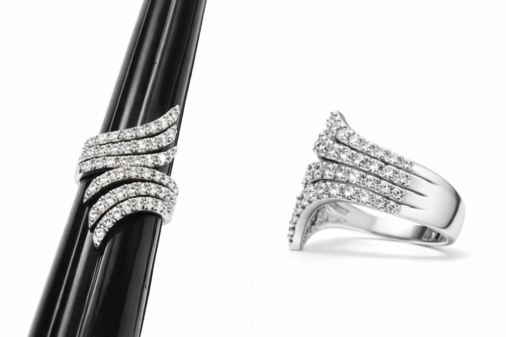 Vintage 925 Sterling Silver CZ Wave Ring: Vintage .925 sterling silver cubic zirconia wave ring. Stamped with hallmark and '925' on inside. Very minor signs of wear, otherwise in very good condition. Size 9.25 Weight 7g