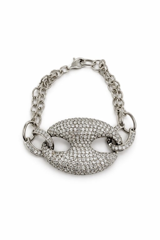 .925 Sterling Silver CZ 3 Ring Chain Bracelet: .925 sterling silcer Cubic zirconia 3 ring chain bracelet. Stamped '925' on clasp. One stone missing on center ring and minor signs of wear, otherwise in good condition. Weight 23g