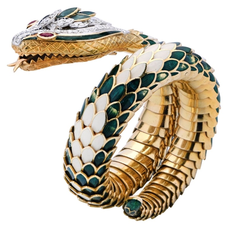 18k Two Tone Fred Paris Snake Bracelet- V52555: 18k Two Tone Fred Paris Snake Bracelet- V52555 A bold and sculptural statement, this Fred Paris snake bracelet is crafted in luxurious 18k yellow and white gold. The fluid, coiled design captures the