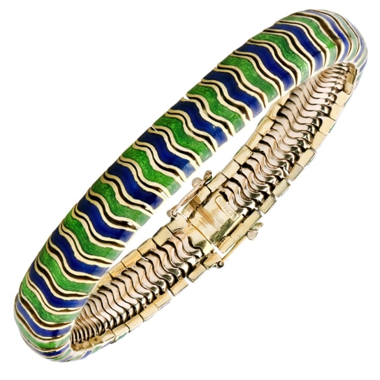 18k Yellow Gold Tiffany & Co. Enamel Bracelet: 18k Yellow Gold Tiffany & Co. Blue and Green Enamel Bracelet- 53260 A vibrant and distinctive Tiffany & Co. bracelet crafted in rich 18k yellow gold, featuring striking blue and green enamel detailing