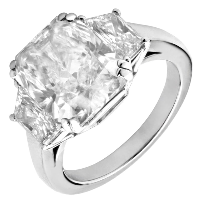5.06 Carat Radian Cut Diamond Ring: 5.06 Carat Radian Cut Diamond Ring A breathtaking statement of brilliance, this platinum diamond ring features a stunning 5.06-carat radiant cut diamond, certified by GIA. Graded F color with SI1 clar