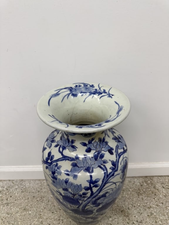 Vintage Chinese Floral Porcelain Vase: Vintage 20th century Chinese floral porcelain vase. No make or marks. Signs of wear and age, some cracking in the paint visible and a crack along the bottom of the vase, otherwise in good condition. H