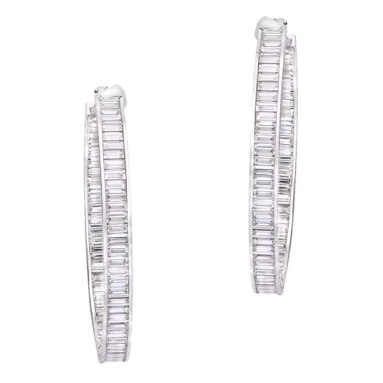 32ct Diamond Hoops: 32ct Diamond Hoops - V52597 An extraordinary statement of high-jewelry brilliance, these diamond hoop earrings are crafted in luxurious 18k white gold and set with an impressive 32 carats of diamonds.