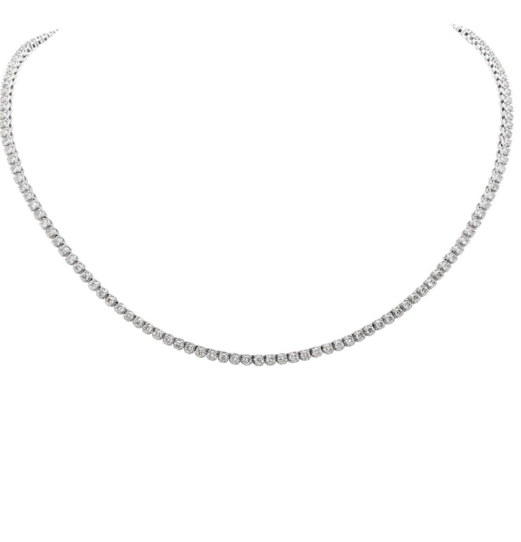 5.70 Carat Diamond Tennis Necklace in White Gold: 5.70 Carat Diamond Tennis Necklace in White Gold SKU: 43404 Discover the exquisite elegance of the Straight Line 5.70 Carat Diamond Tennis Necklace from Vivid Diamonds, designed to illuminate your sty