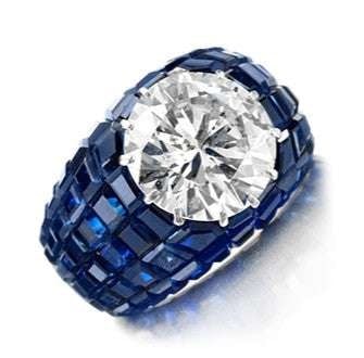 7.38 Ct Round Brilliant Diamond & Sapphire Ring: Oscar Heyman 7.38 Ct Round Brilliant Diamond & Blue Sapphire Platinum Ring SKU: 48885 Experience Timeless Elegance Elevate your jewelry collection with the Oscar Heyman Sapphire & Diamond Ring - a stu