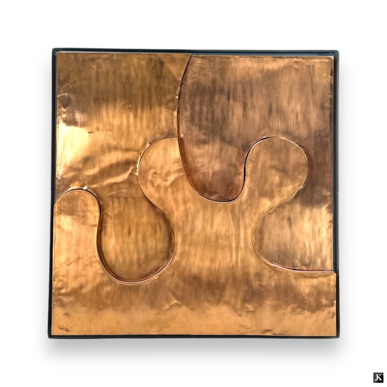 Tom Herr (USA20th C) Heavy 3-D Copper Sculpture: Tom (Thomas) Allen Herr (AMERICAN, 20th Century) three dimensional abstract copper metal sculpture titled "Puzzle". Mounted in a silver tone metal frame. Measures approx. 25 1/4" height x 25" width.