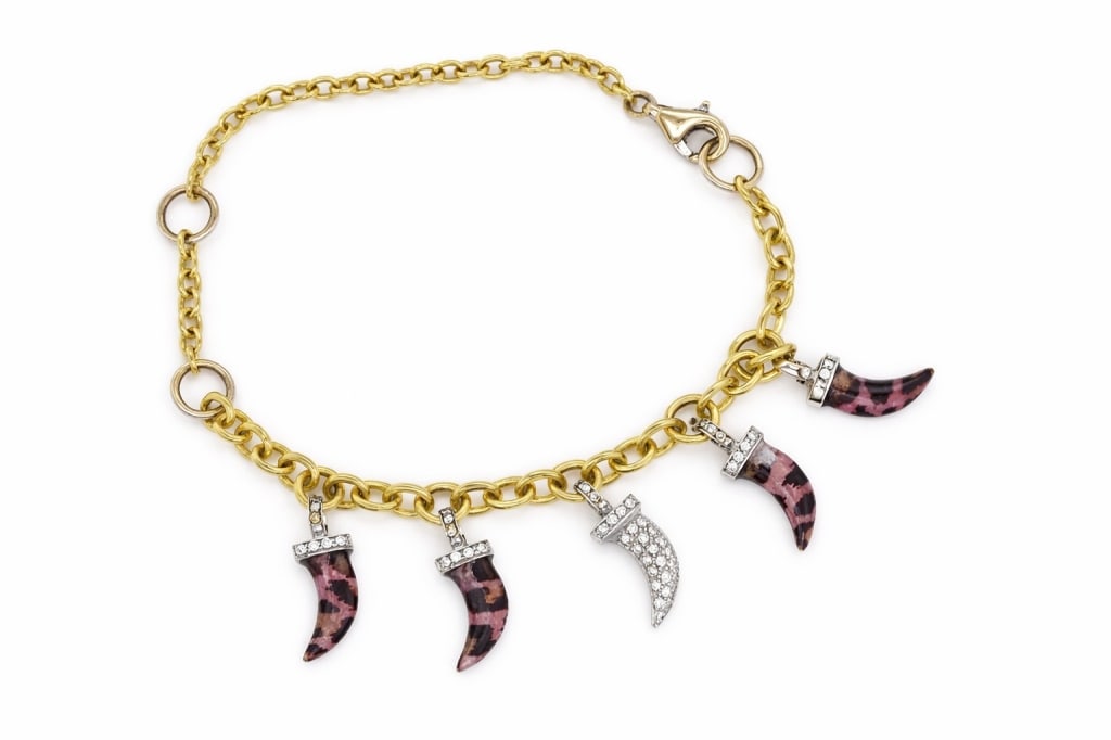 Hallmarked Italian Diamond Horn Bracelet: Hallmarked Italian Diamond Horn Bracelet . 18K Gold 12.0 DWT. Measures 8 1/2 Long Stamped, Hallmarked & Serial Number