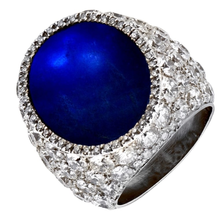 34.18 Carat AGL Ceylon Sapphire And Diamond Ring: 34.18 Carat AGL No Heat Ceylon Sapphire And Diamond Ring -V52008 An extraordinary statement piece, this impressive ring features a rare 34.18-carat AGL-certified no-heat Ceylon sapphire, showcased in