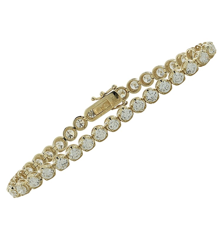 4.16 Carat Straight Line Diamond Tennis Bracelet: 4.16 Carat Straight Line Diamond Tennis Bracelet - V32770-1 An elegant straight line tennis bracelet crafted in 18k yellow gold, featuring 46 round brilliant diamonds totaling 4.16 carats. Each diamon