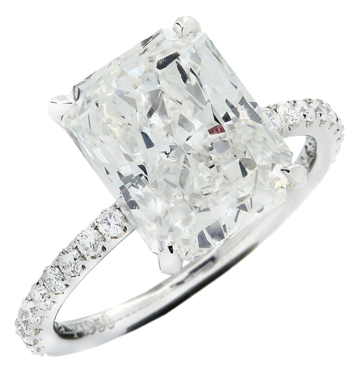 5.05 Carat Radiant Cut Diamond Engagement Ring: 5.05 Carat Radiant Cut Diamond Engagement Ring - V42188 This elegant platinum engagement ring features a stunning 5.05-carat radiant cut diamond, GIA certified with H color and SI1 clarity. The elonga