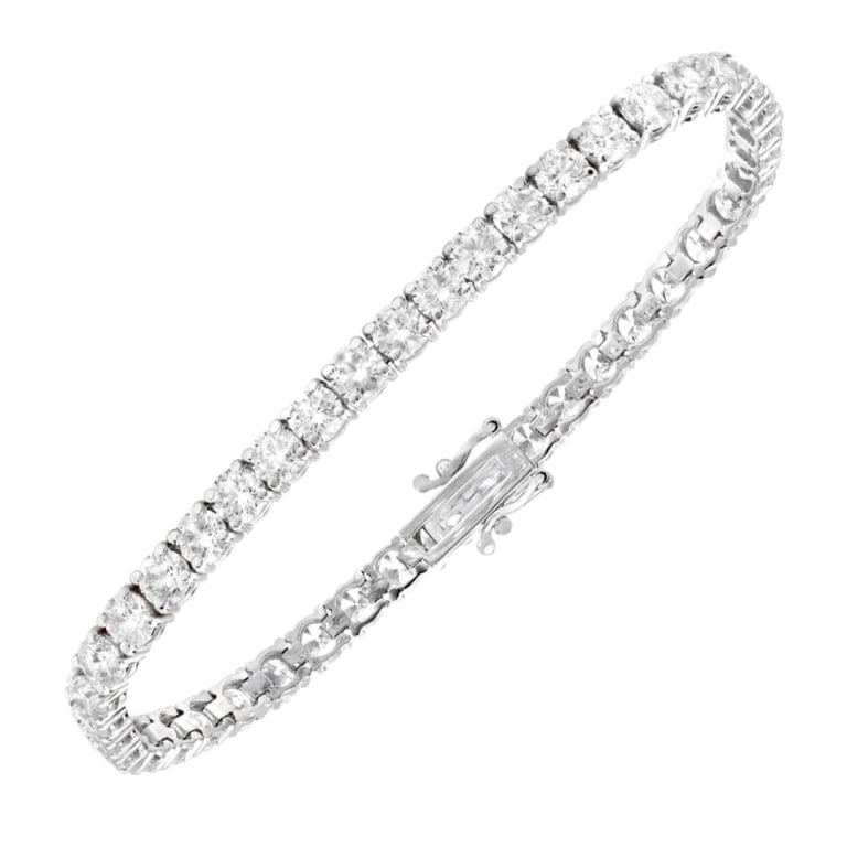 14k White Gold Diamond Tennis Bracelet: 14k White Gold Diamond Tennis Bracelet - V 51461 A stunning display of timeless elegance, this 14k white gold tennis bracelet showcases a continuous stream of radiant brilliance. Set with 43 round bri