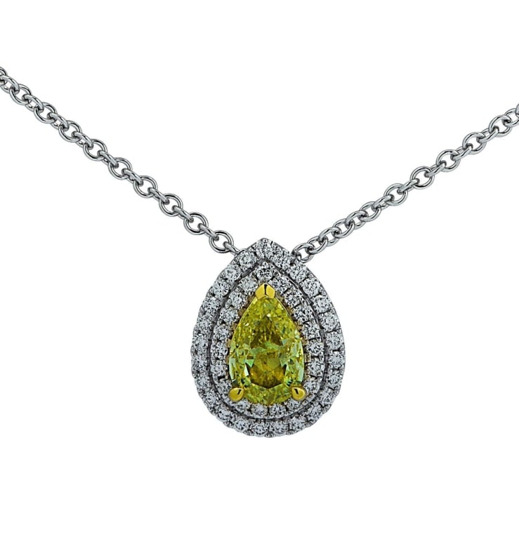 GIA Certified 1.01 Fancy Yellow Diamond Pendant: GIA Certified 1.01 Fancy Yellow Double Halo Diamond Pendant Necklace -V31043-1 A radiant expression of color and brilliance, this Vivid Diamonds double halo pendant necklace features a stunning 1.01-c