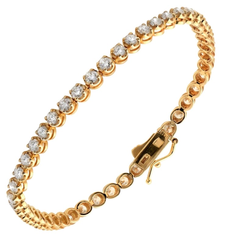 3.94ct Diamond Bracelet: 3.94ct Diamond Bracelet - V45443-1 An embodiment of timeless sophistication, this exquisite diamond tennis bracelet from Vivid Diamonds is crafted in rich yellow gold and set with 46 round brilliant c