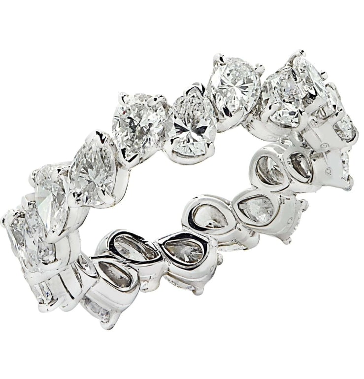 3.29ct Pear Shape Diamond Eternity Band: 3.29ct Pear Shape Diamond Eternity Band -V41641-1 A dazzling circle of brilliance, this pear-shape diamond eternity band is a striking expression of elegance and modern sophistication. Crafted in plat