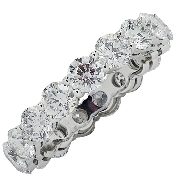 3.12 Carat Platinum Eternity Band: 3.12 Carat Platinum Eternity Band - D-F Color, VS-SI Clarity, Size 5.75 SKU: 38240 Discover the elegance of the 3.12 Carat Diamond Eternity Band, a true masterpiece in fine jewelry. Handcrafted in pre