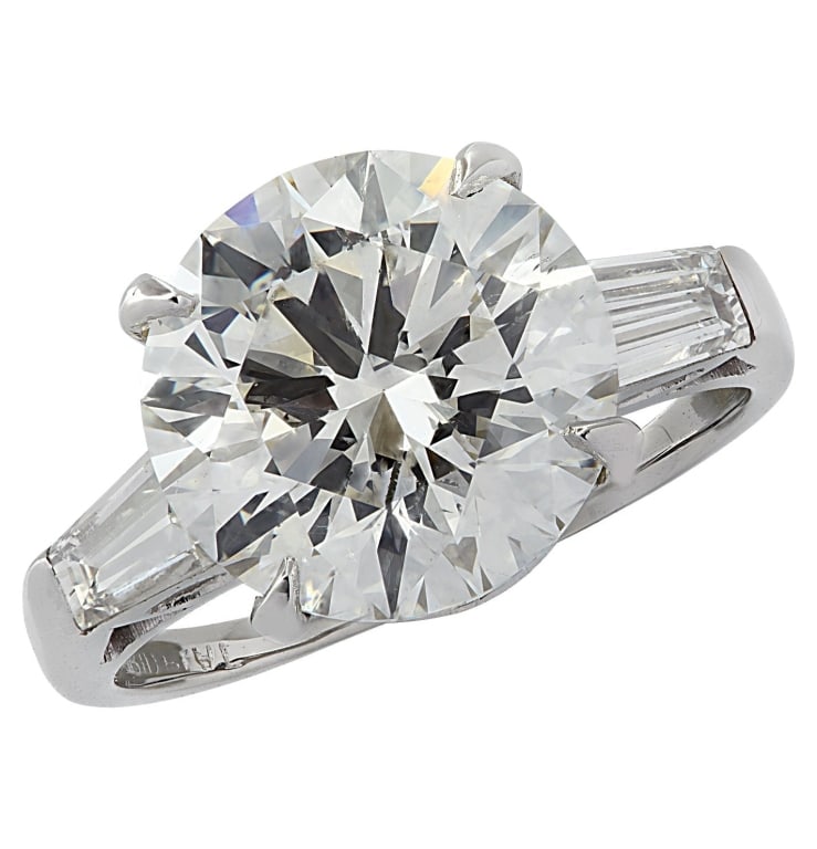 GIA Certified 4.54 Carat Diamond Engagement Ring: GIA Certified 4.54 Carat Diamond Engagement Ring -V30012-1 SKU: 30012-1 A stunning statement of sophistication and timeless beauty, this engagement ring features a magnificent GIA-certified