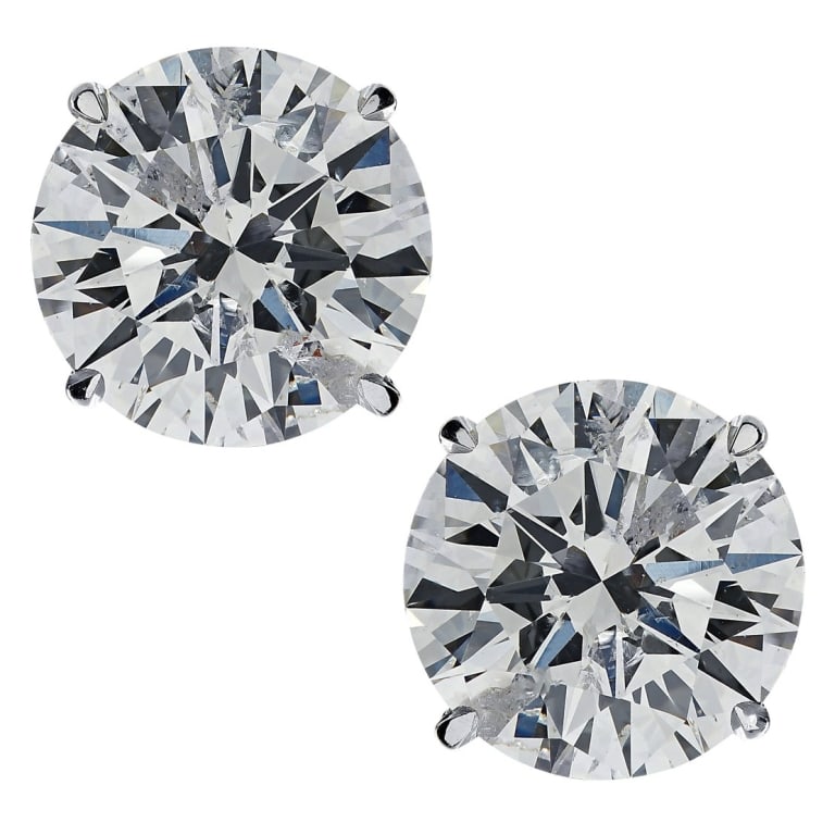 GIA Certified 4.11 Carat Diamond Stud Earrings: GIA Certified 4.11 Carat Diamond Solitaire Stud Earrings - V34549-1 SKU: 34549-1 An iconic statement of brilliance and sophistication, these solitaire stud earrings feature two GIA-certified round