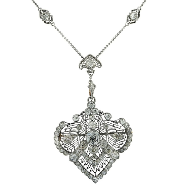 14.60ct Edwardian Brooch Pin / Necklace: 14.60ct Edwardian Brooch Pin / Necklace in Platinum & Yellow Gold - V35815-1 SKU: 35815-1 An exquisite relic of Edwardian elegance, this convertible brooch and necklace masterfully combines opulence,