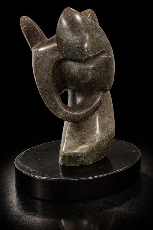 Abstract Carved Marble Figure: Abstract Carved Marble Figure. Measures 8 inches high x 11 inches length.