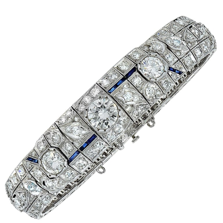 Elegant 12ct Diamond and Sapphire Bracelet: Elegant 12ct Diamond and Sapphire Bracelet - V11687-1 SKU: 11687-1 A stunning fusion of brilliance and color, this platinum diamond and sapphire bracelet epitomizes timeless elegance and refined