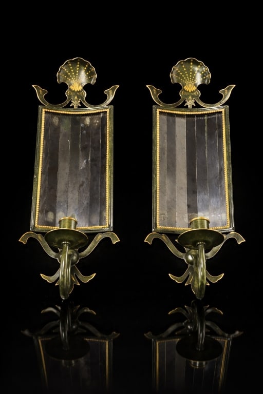 French Mirrored Glass & Metal Sconces: French Mirrored Glass & Metal Sconces with candle sticks. Measures 21 inches length x 8 inches wide.
