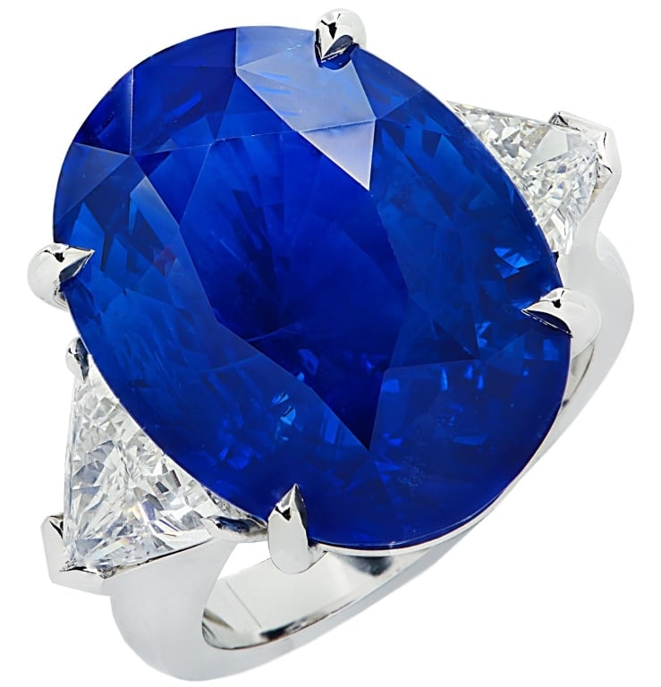 21ct Oval Cut Sapphire Ring: 21ct Oval Cut Sapphire Ring - V41535-1 SKU: 41535-1 A breathtaking expression of color and craftsmanship, this platinum ring showcases an extraordinary 21-carat oval-cut sapphire of vivid, velvety blu