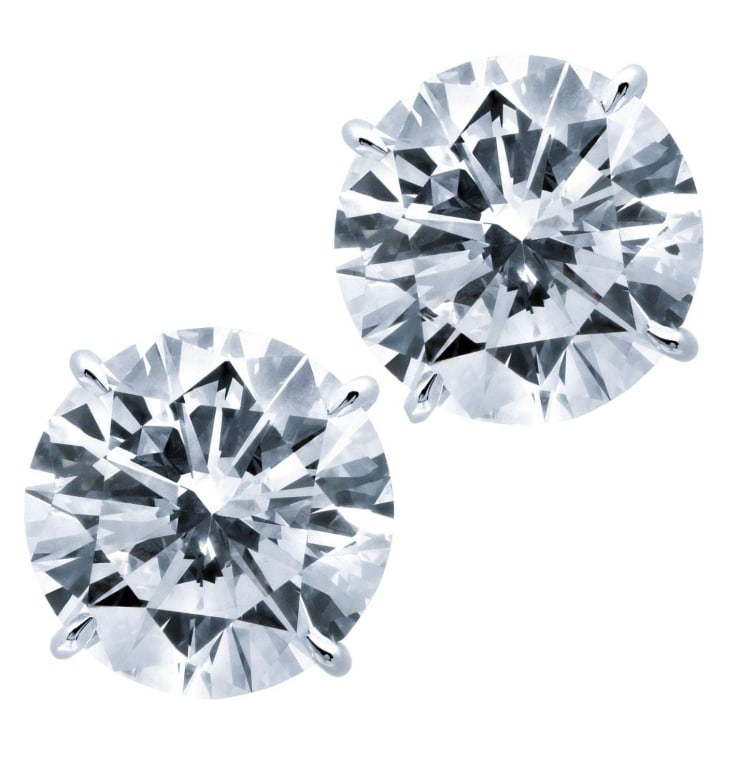 3.41 Carat Round Brilliant Diamond Stud Earrings: 3.41 Carat Round Brilliant Diamond & Platinum Stud Earrings - VVS1 Clarity SKU: 47886 Discover the exquisite beauty of our Stud Diamond & Platinum Stud Earrings, a perfect blend of timeless elegance a