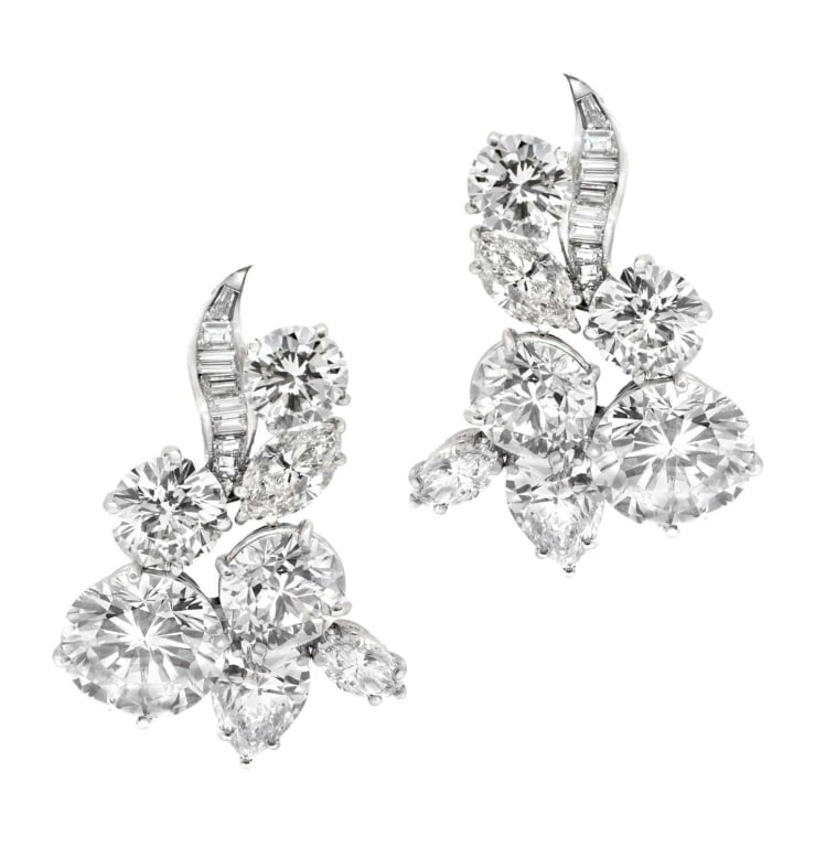 12.86 Carat Diamond and Platinum Stud Earrings: 12.86 Carat Diamond and Platinum Harry Winston Stud Earrings -V51186 SKU: 51186 A breathtaking expression of brilliance and prestige, these Harry Winston diamond stud earrings exemplify the pinnacle o