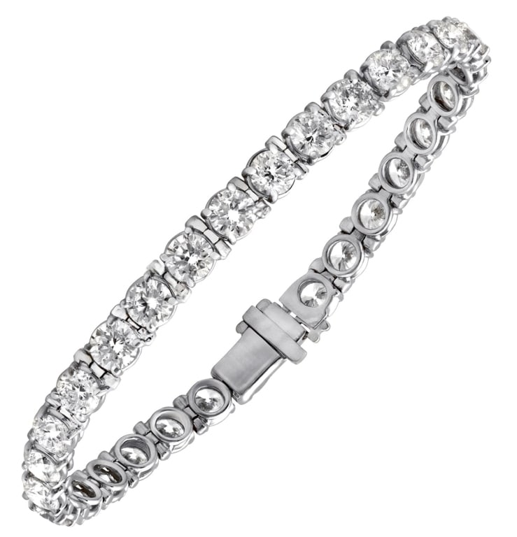 12 Carat Diamond Tennis Bracelet: 12 Carat Diamond Tennis Bracelet -V42926 SKU: 42926 A timeless expression of elegance, this diamond tennis bracelet is crafted in luminous 14k white gold and adorned with a continuous line of 30 round