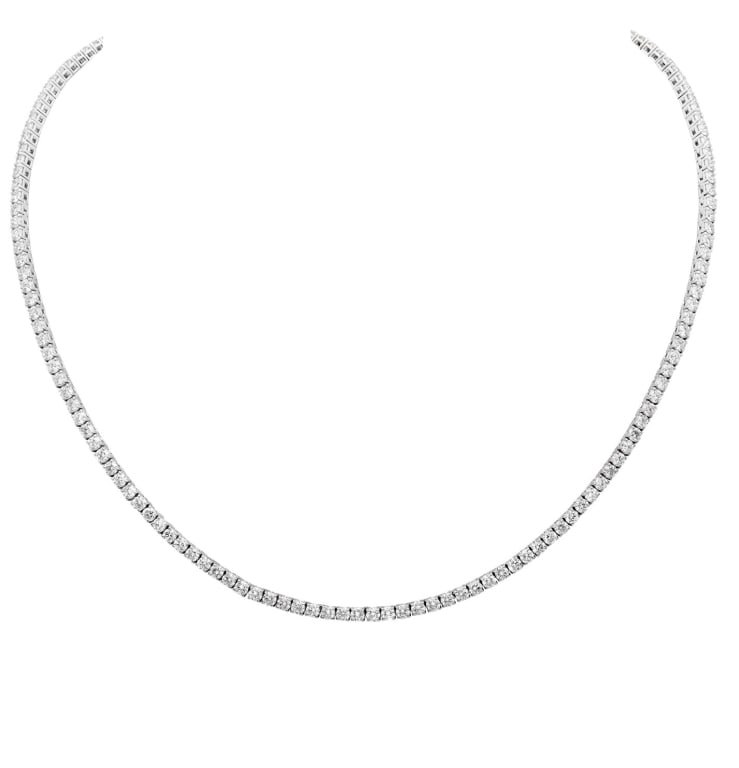 18k White Gold 9.05ct Diamond Necklace: 18k White Gold 9.05ct Diamond Necklace – V50810 SKU: 50810 Refined and radiant, this 18k white gold necklace is adorned with 158 round brilliant diamonds totaling 9.05 carats. The seamless arrangeme